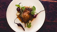 Slow cooked duck leg with baby beetroot, French lentils & hazelnut vinaigrette