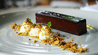 Chocolate pave, toffee cream, sour cream mousse, peanut crumble